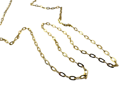 Gold chain necklace on a white background